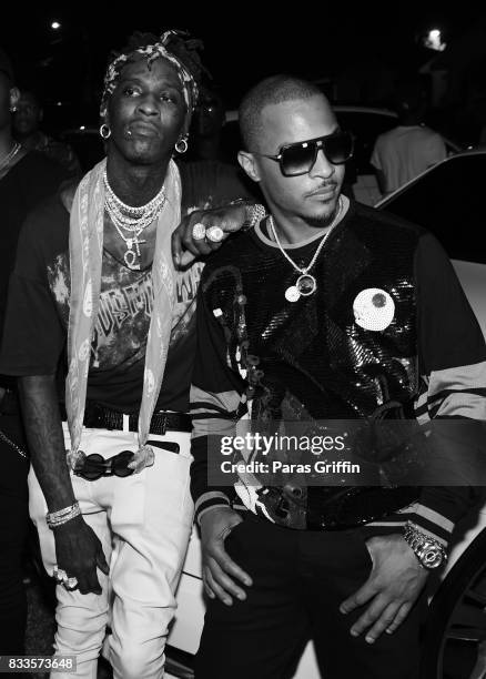 Rappers Young Thug and T.I. At Young Thug Private Birthday Celebration at Tago International on August 16, 2017 in Atlanta, Georgia.