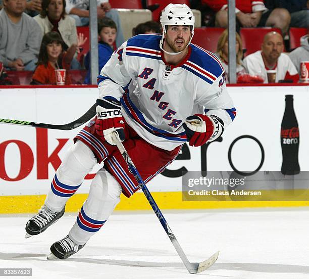 Aaron Voros of the New York Rangers skates in a game against the Detroit Red Wings on October 18, 2008 at the Joe Louis Arena in Detroit, Michigan....