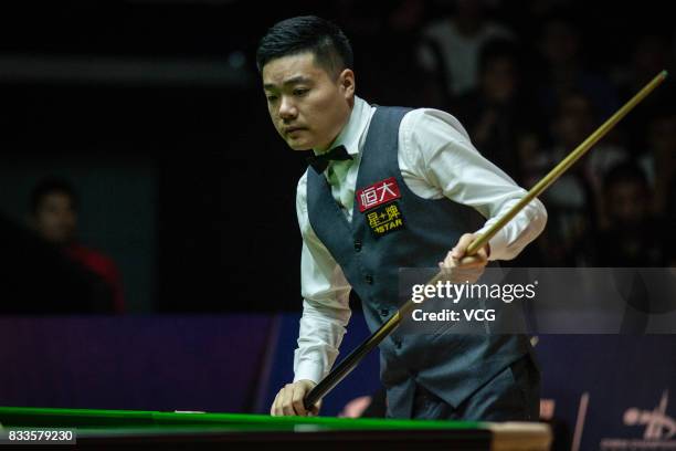 Ding Junhui of China reacts during his first round match against Alfie Burden of England on day two of Evergrande 2017 World Snooker China Champion...