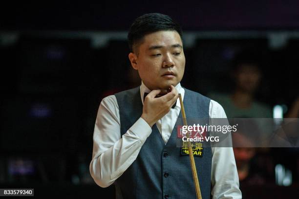 Ding Junhui of China reacts during his first round match against Alfie Burden of England on day two of Evergrande 2017 World Snooker China Champion...