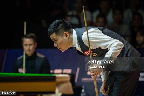 Ding Junhui of China reacts during his first round match against Alfie Burden of England on day two of Evergrande 2017 World Snooker China Champion...