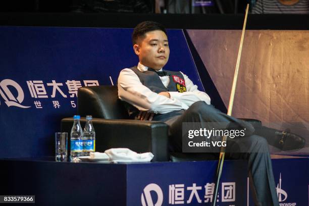 Ding Junhui of China reacts during his first round match against Alfie Burden of England on day two of Evergrande 2017 World Snooker China Champion...