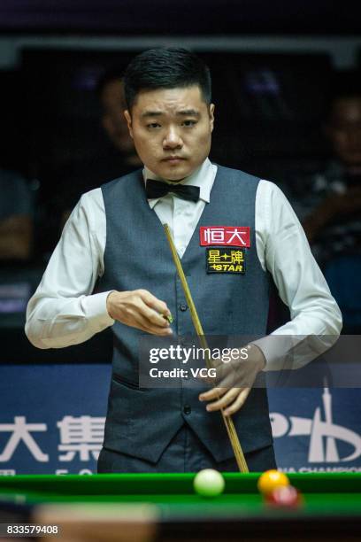 Ding Junhui of China reacts during his first round match against Alfie Burden of England on day two of Evergrande 2017 World Snooker China Champion...