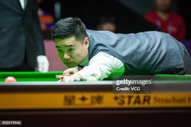 Ding Junhui of China plays a shot during his first round match against Alfie Burden of England on day two of Evergrande 2017 World Snooker China...