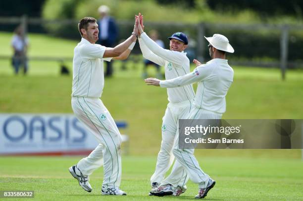 Dublin , Ireland - 17 August 2017; Ireland players, from left, Boyd Rankin, William Porterfield and Andrew Balbirnie celebrate the wicket of Max...