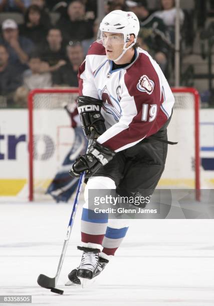 Joe Sakic of the Colorado Avalanche handles the puck against the Dallas Stars on October 18, 2008 at the American Airlines Center in Dallas, Texas.