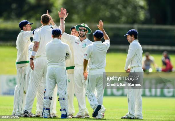 Dublin , Ireland - 17 August 2017; Andrew Balbirnie of Ireland, centre, is congratulated by team mates after catching out Max O'Dowd of Netherlands...