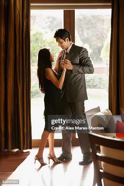couple dancing in home - stereotypically upper class stock pictures, royalty-free photos & images