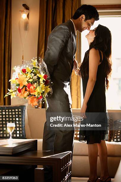 man and woman touching noses - stereotypically upper class stock pictures, royalty-free photos & images