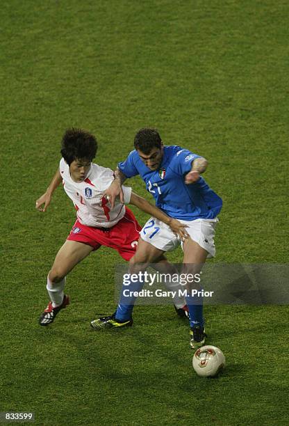 Christian Vieri of Italy battles with Ji Sung Park of South Korea during the World Cup Second Round match between South Korea v Italy, played at the...