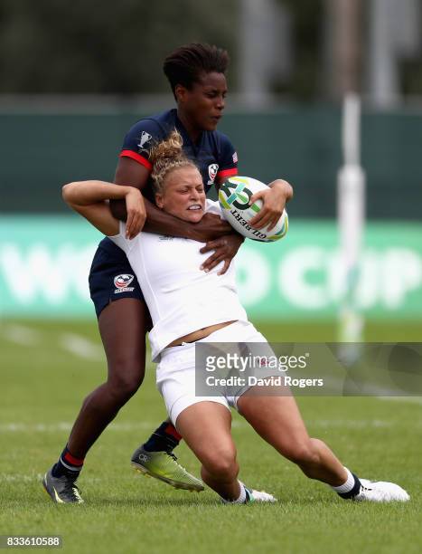 Kay Wilson of England is tackled by Naya Tapper of USA during the Women's Rugby World Cup Pool B match between England and USA at Billings Park UCB...
