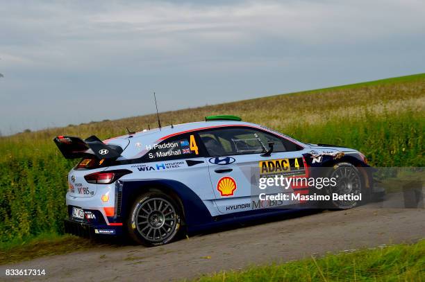 Hayden Paddon of New Zealand and Sebastien Marshall of Great Britain compete in their Hyundai Motorsport WRT Hyundai i20 Coupè WRC during the...