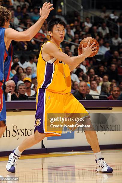 Sun Yue of the Los Angeles Lakers drives with the ball against Regal FC Barcelona at Staples Center on October 18, 2008 in Los Angeles, California....