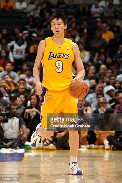 Sun Yue of the Los Angeles Lakers drives with the ball against Regal FC Barcelona at Staples Center on October 18, 2008 in Los Angeles, California....