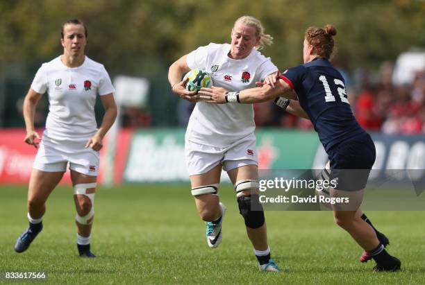 Tamara Taylor of England is tackled by Alev Kelter of USA during the Women's Rugby World Cup Pool B match between England and USA at Billings Park...