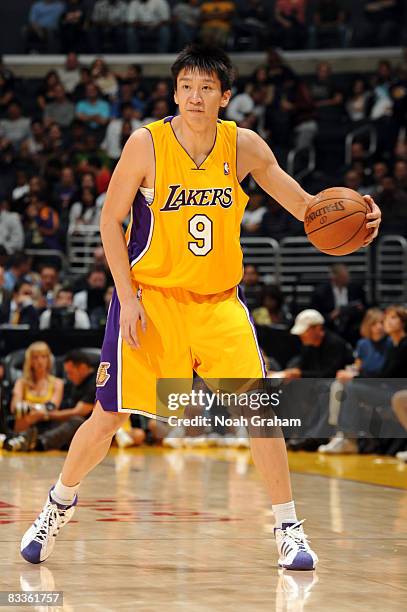 Sun Yue of the Los Angeles Lakers drives with the ball against Regal FC Barcelona at Staples Center on October 18, 2008 in Los Angeles, California....