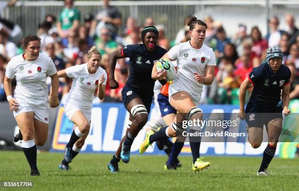 Abbie Scott of England runs with the ball during the Women's Rugby World Cup Pool B match between England and USA at Billings Park UCB on August 17,...