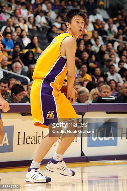 Sun Yue of the Los Angeles Lakers drives with the ball against Regal FC Barcelona at Staples Center on October 18, 2008 in Los Angeles, California....
