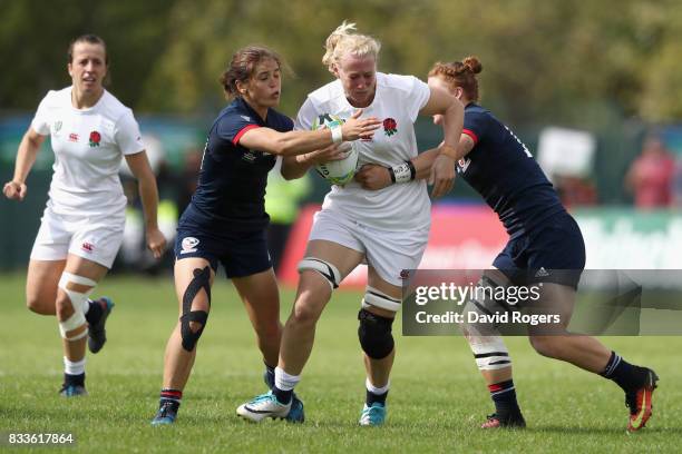 Tamara Taylor of England is tackled by Kimber Rozier and Alev Kelter of USA during the Women's Rugby World Cup Pool B match between England and USA...