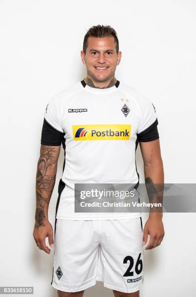 Raul Bobadilla pose with his new shirt after he signs a new contract for Borussia Moenchengladbach at Borussia-Park on August 17, 2017 in...