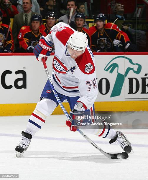 Andrei Markov of the Montreal Canadiens fires a slapshot and bends the shaft of his stick against the Florida Panthers at the Bell Centre on October...