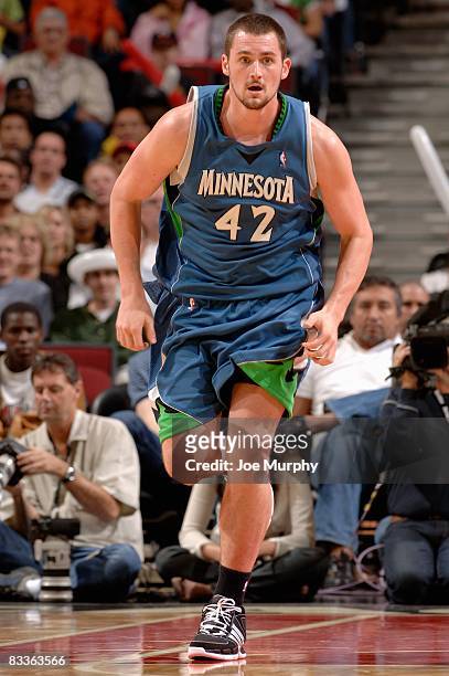 Kevin Love of the Minnesota Timberwolves runs upcourt during the preseason game against the Chicago Bulls at the United Center on October 14, 2008 in...