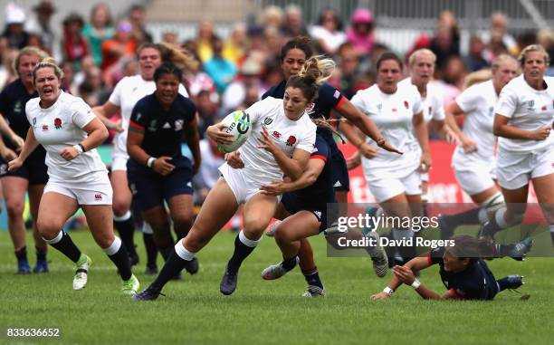 Amy Wilson Hardy of England is tackled during the Women's Rugby World Cup Pool B match between England and USA at Billings Park UCB on August 17,...