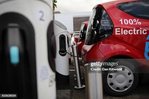 Charging plug connects an electric vehicle to a charging station on August 17, 2017 in London, England. A study commissioned by power generation...