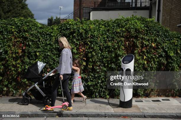 General view of an electric vehicle charging station on August 17, 2017 in London, England. A study commissioned by power generation company Drax...