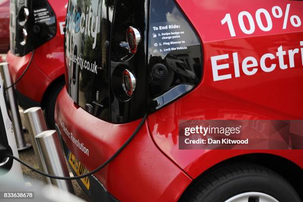 Charging plug connects an electric vehicle to a charging station on August 17, 2017 in London, England. A study commissioned by power generation...