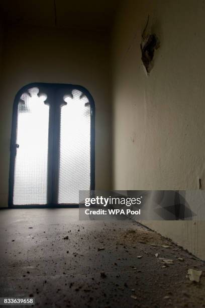 Peeling paintwork and chipped masonry on the stairwell of the Elizabeth Tower ahead of the bell ceasing to ring on Monday at the Palace of...