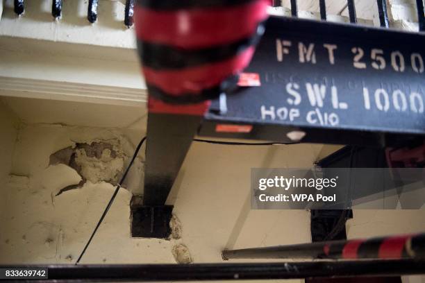 Peeling paintwork and chipped masonry on the stairwell of the Elizabeth Tower ahead of the bell ceasing to ring on Monday at the Palace of...