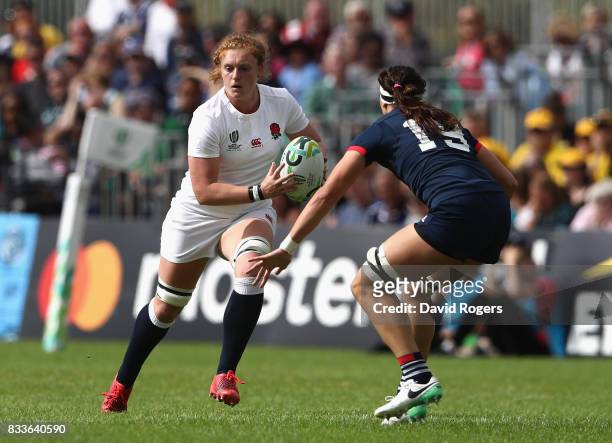 Harriet Millar-Mills of England takes on Abby Gustaitis of USA during the Women's Rugby World Cup Pool B match between England and USA at Billings...