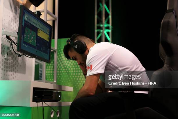 Philip "FilthyP94" Balkhe of Canada reacts during his semi final match against Florian "Codyderfinisher" Mller of Germany on day two of the FIFA...