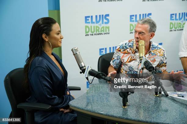 Recording artist Demi Lovato and radio host Elvis Duran visit "The Elvis Duran Z100 Morning Show" to discuss her upcoming album at Z100 Studio on...