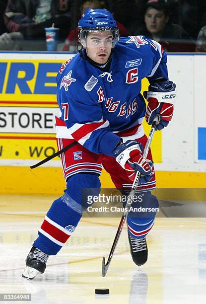 Ben Shutron of the Kitchener Rangers skates with the puck in a game against the London Knights on October 19, 2008 at the John Labatt Centre in...