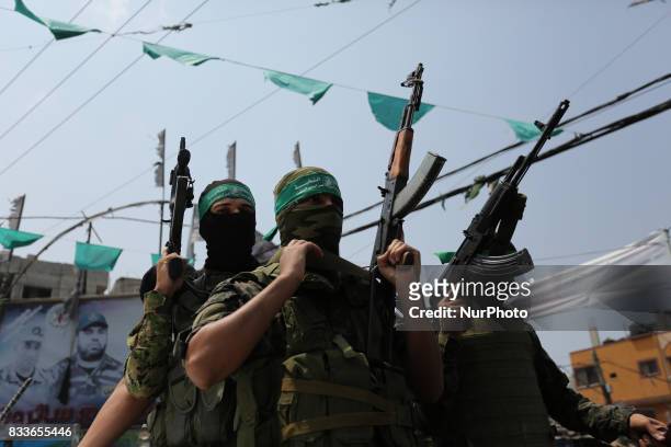 Mourners and Hamas militants carry the body of Nidal al-Jaafari, a 28-year-old field commander who was killed overnight in a suicide attack that...