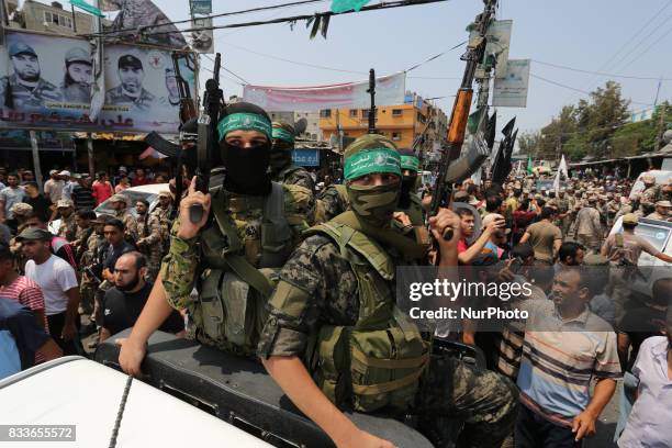 Mourners and Hamas militants carry the body of Nidal al-Jaafari, a 28-year-old field commander who was killed overnight in a suicide attack that...