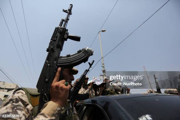 Mourners and Hamas militants carry the body of Nidal al-Jaafari, a 28-year-old field commander who was killed overnight in a suicide attack that...