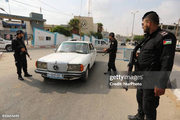 Palestinian policemen stop a vehicle at a security checkpoint, in Rafah in the southern of Gaza Strip August 17, 2017. A suicide bomber killed a...