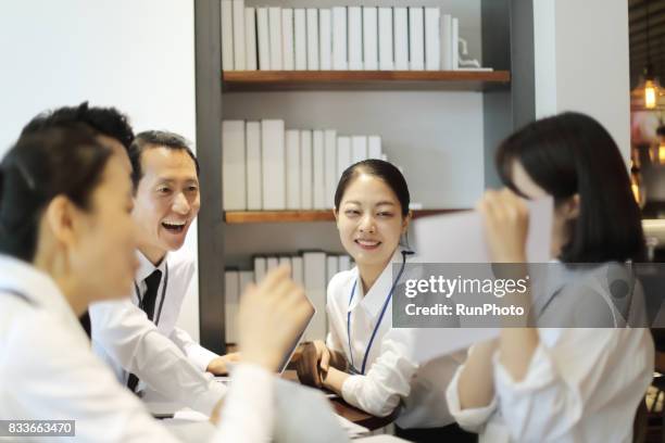 company's boss enjoying watching charts - south korea office stock pictures, royalty-free photos & images