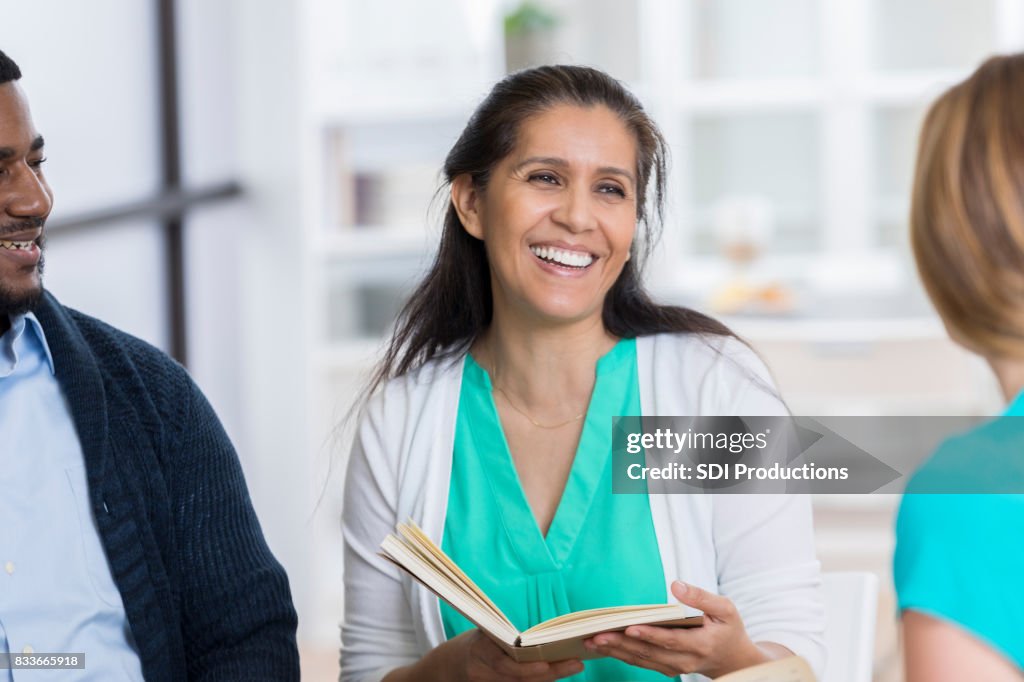 Confident Woman Leads Study Group High-Res Stock Photo - Getty Images
