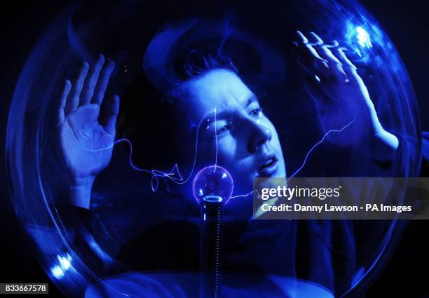 Twelve-year-old Scot Morrison looks through a Plasma ball during the launch of National Science and Engineering Week 2007 at Glasgow Science Centre.