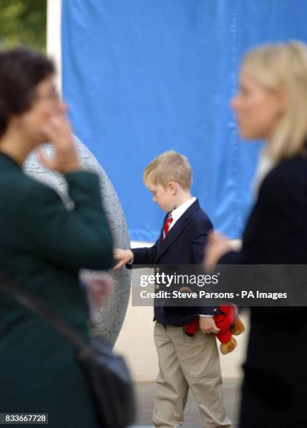 Wilson Young looks at the memorial to those who died in the Bali bombings four years ago, on Clive Steps at Horse Guards Road, London, before the...