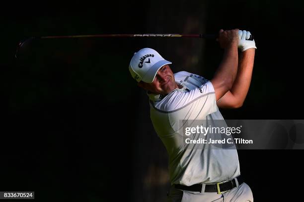 Brian Stuard plays his tee shot on the second hole during the first round of the Wyndham Championship at Sedgefield Country Club on August 17, 2017...