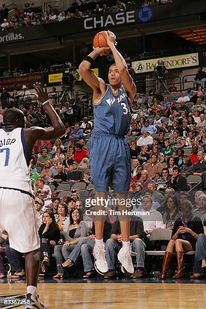 JaVale McGee of the Washington Wizards shoots a jumper over DeSagana Diop of the Dallas Mavericks during the preseason game on October 7, 2008 at the...