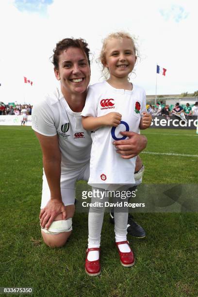 Sarah Hunter of England and her niece Isabelle Niamh Hunter celebrate on the pitch following the Women's Rugby World Cup Pool B match between England...