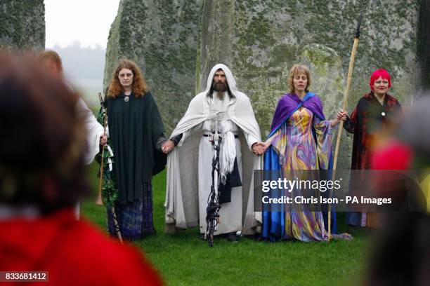 Druids perform a Samhain or pagan Halloween style blessing ceremony at Stonehenge in Wiltshire.