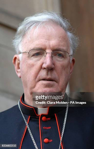 Cardinal Cormac Murphy-O'Connor addresses worshippers outside Westminster Cathedral after they took part in a Good Friday procession through central...