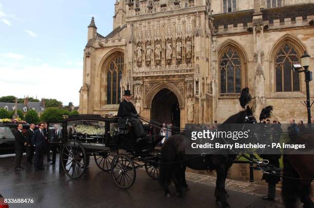 The coffin of Isabella Blow arrives outside Gloucester Cathedral for her funeral service.
